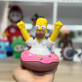 Figura Homer Simpson subido en Donut, Fanart coleccionable 14cm.